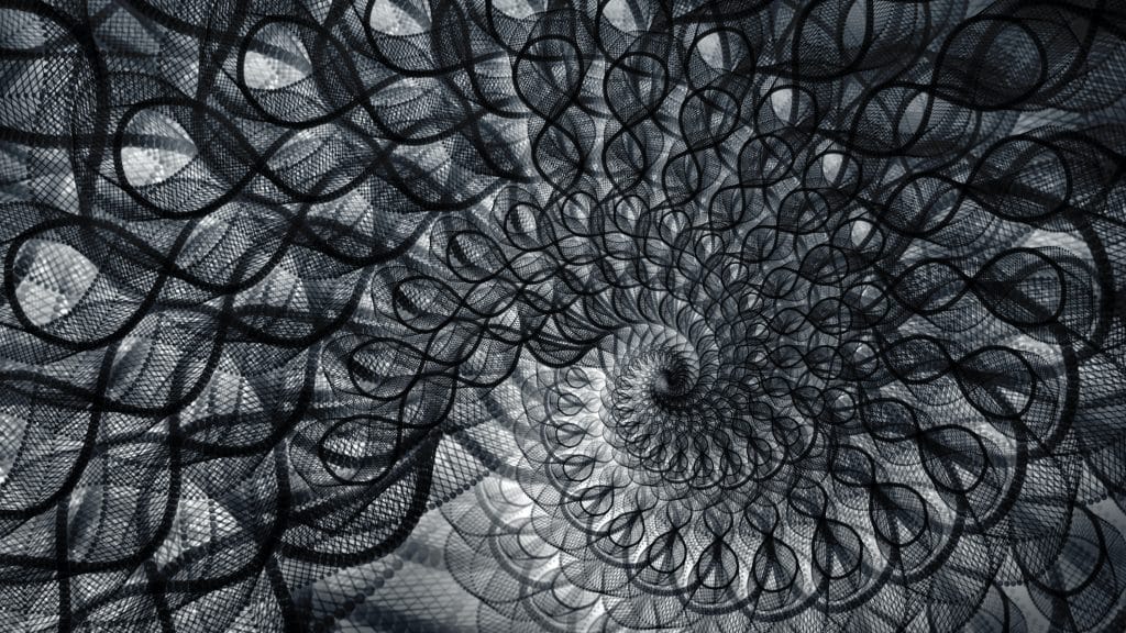 An abstract image of an endless threaded black and grey swirl of string and netting that spirals into the center of the image.